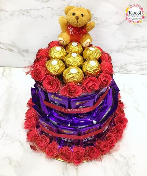 Chocolate tower cake Chocolate Tower Cake, Chocolate Tower, Tower Cake, Chocolate Bouquet Diy, Chocolate Hampers, Wedding Gifts Packaging, Gift Packing, Chocolate Bouquet, Diy Bouquet