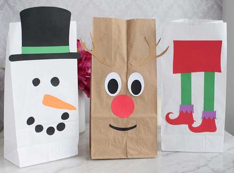 Diy Christmas Bags Ideas, Paper Bag Snowman, Christmas Paper Bags Ideas, Snowman In A Bag, Christmas Party Bags For Kids Cricut, Santa Bags For Kids, Paperbag Reindeer Paper Bags, Snowman Bag, Reindeer Gift Bags Brown Paper