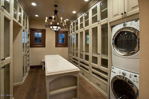 Traditional Closet with Custom Cabinetry, Exquisite Antique Five-Light Chandelier with Original Shade, Hardwood floors Traditional Laundry Room, Amazing Closets, Dream Master, Laundry Closet, Enchanted Home, Dream Closets, Laundry Room Storage, Laundry Mud Room, Room Closet