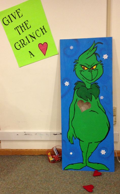 Grinch Selfie Station, Christmas Bean Bag Toss, Grinch Photo Props, The Grinch Trunk Or Treat Ideas, Grinch Activities For Toddlers, Whoville Crafts For Kids, Grinch Themed Games, Grinch Themed Party Games, Grinch Doors