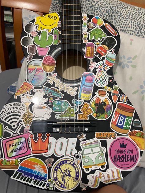 Guitar Design Ideas Stickers, Acoustic Guitar Stickers Ideas, Acoustic Guitar Aesthetic Stickers, Decorated Guitars Stickers, Guitar Covered In Stickers, Stickers On Guitar Acoustic, Electric Guitar With Stickers, Guitar Acoustic Aesthetic, Guitar Stickers Aesthetic