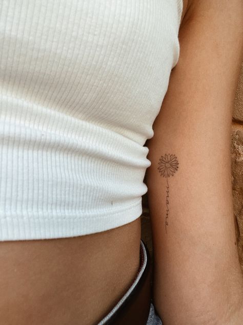 Sun Daisy Tattoo, Dainty Daisy Tattoo Wild Flowers, Gerbera Daisies Tattoo, Sunflower Tattoo Bicep, Sunflower Tattoo Placement Ideas, Mother Flower Tattoo, Fine Line Gerbera Daisy Tattoo, Sunflower Tattoo Ribcage, Daisy Hip Tattoo