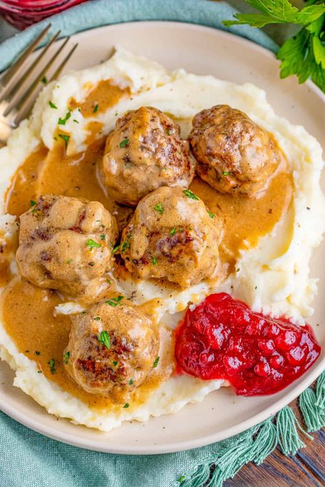 Flavorful, filling and comforting these Copycat IKEA Swedish Meatballs are a delicious recipe that you can make at home! A fun recipe that the whole family will fall in love with. Ikea Swedish Meatballs, Beef And Pork Meatballs, Lingonberry Jam, Swedish Cuisine, Crockpot Chicken And Noodles, Savory Meatballs, Pork Meatballs, Simple Green Salad, Parmesan Crusted Chicken