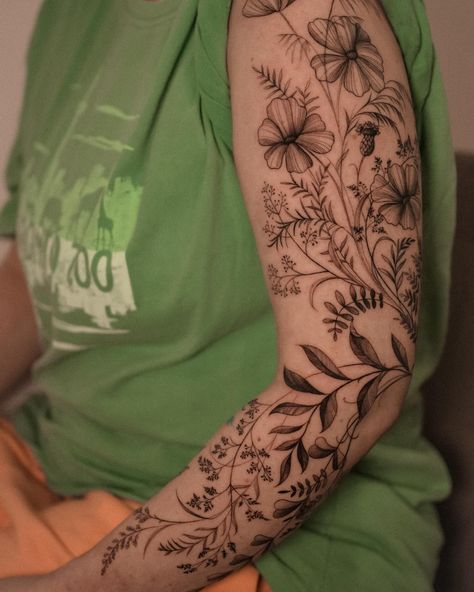 🌿✨ Taking a closer look at the intricate details of this floral sleeve tattoo, drawn entirely in free-hand technique 🌱🌱🌱 #floraltattoo#branchtattoo#sleevetattoo#plantstattoo#flowertattoo#tinytattoo#finelinetoronto#finelinetattoo#tattootoronto Wildflower Arm Sleeve, Wildflower Arm Wrap Tattoo, Mixed Flower Tattoo Half Sleeves, Filler Floral Tattoo, Sleeve Background Tattoo, Floral Sleeve Filler, Floral Sleeve Tattoo Men, Patchwork Floral Sleeve Tattoo, Wild Flower Half Sleeve Tattoo