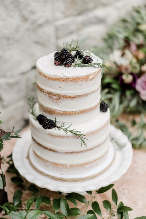 Naked wedding cake! Berries, white icing, greenery #dreamcake #dreamwedding Fern Wedding Cake, Green Wedding Dessert Table, Wedding Cakes With Greenery, Two Tier Naked Wedding Cake, Wedding Cake Berries, Green Wedding Cakes, Botanical Wedding Cake, Wedding Cakes White, Eternal Marriage