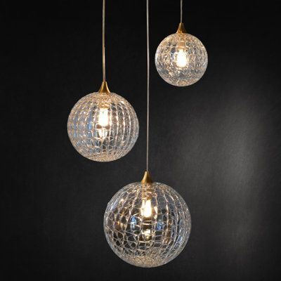 A combination of 4”, 5”, and 6.3” Breeze glass globe pendants in different heights is ideal for over a vanity, kitchen island, counter, nightstand, side table, or even a small dining table. Beautiful on a kitchen nook area. The beautiful artisan pendant features a woven glass globe and each pendant is refined and hand painted in joyful artisan glass. The beauty of the detailed web texture adorned to the glass is simply breathtakingly visible through the soft glow of light fixtures. Enjoy the bea Web Texture, Lighting House, Kitchen Island Counter, Globe Light Fixture, Modern Living Room Lighting, Island Counter, Custom Chandelier, Small Dining Table, 3 Light Pendant