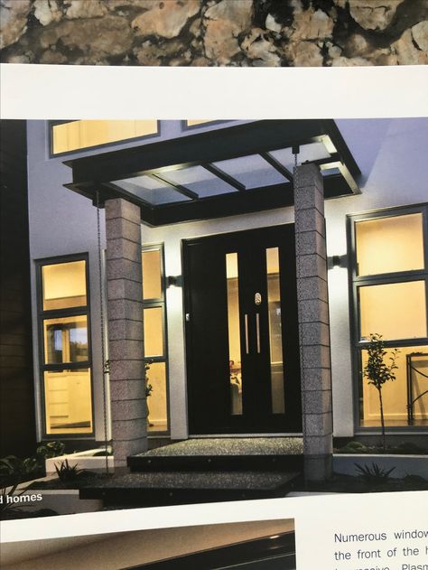 Idea for a front door and portico (like the basic concrete block pillars and chain down pipes). Would be keen for either a large pivot door or double door entry. Modern Pillar Design Exterior Entrance, Front Door Pillars Entrance, Portico Entry, House Canopy, Nz House, Front Door Canopy, Front Door Entryway, Pivot Door, Pillar Design