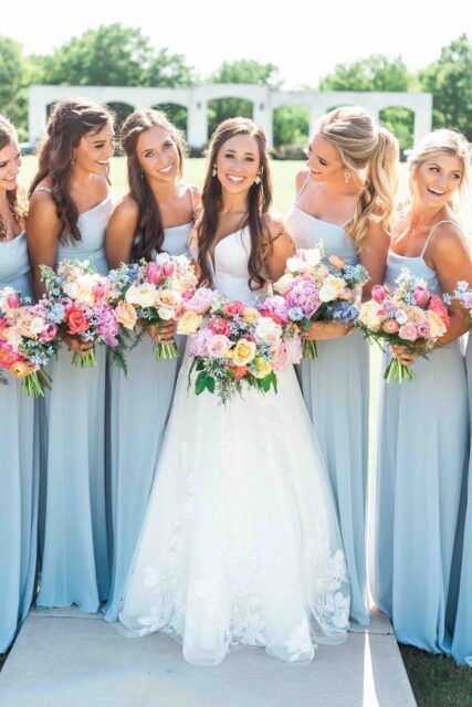 Pastel Tropical Wedding Flowers, Spring Colored Wedding Flowers, Weddings With Colorful Flowers, Summer Simple Wedding Dresses, Dusty Blue With Bright Flowers, April Wedding Colors Bridesmaid Dress, Wedding Flowers For Blue Dresses, Blue Pink Orange Wedding Bouquet, Vibrant Spring Wedding Flowers