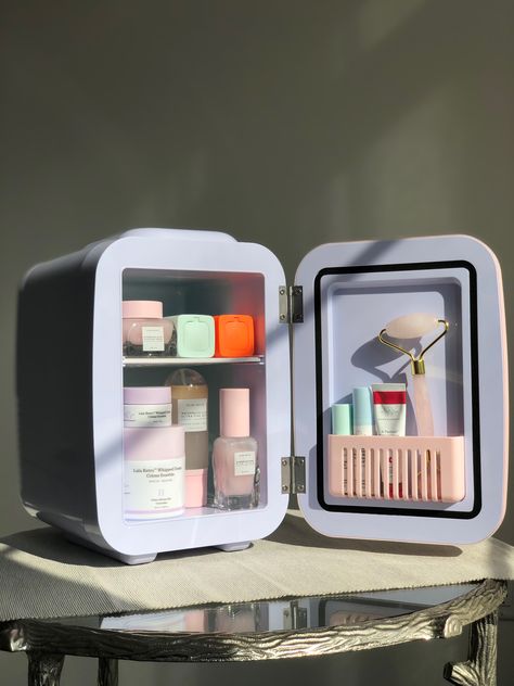 pink skincare fridge with glow recipe products inside. Mini Fridge For Makeup, Mimi Skincare Fridge, Makeup Fridge Aesthetic, Skin Care Holder Aesthetic, Mini Frigerator Organization Skincare, Skincare Freezer, Skin Care Refrigerator, Skin Care Fridge Aesthetic, Skincare Fridge Aesthetic