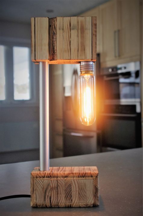 The Recycled Wooden Desk Lamp - Desk Lamps, Wood Lamps -   Unique and original design. Done by hand with recycled materials. Dimmer allows you to enjoy Edison light bulbs and choose the desired brightness; bright lighting or just a soft glow of candlelight. Lightly burnt and sanded wood. Stainless steel and aluminum insertion for a modern touch. Buy Now  #Concept #Design #Desklamp #Edison #Farmhouse #Handmade #Lightbulb #Modern #Recycled #Wood #Woodlamp Wooden Desk Lamp, Wooden Lamps Design, Best Desk Lamp, Wood Lamp Design, Driftwood Lamp, Lamp Makeover, Wood Lamp, Table Lamp Wood, Table Lamp Design