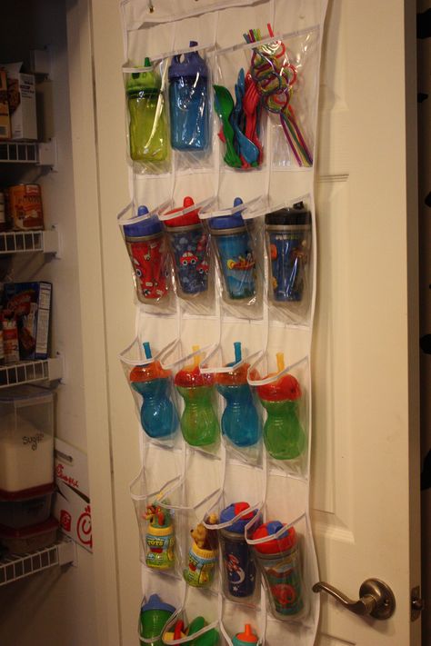 Bottle/Sippy Cup storage using over the door vinyl shoe holder!! Wonder if I could do thing in a cabinet ? Sippy Cup Storage, Sippy Cup Organization, Bottles Organization, Cup Organization, Baby Bottle Organization, Shoes Organization, Baby Bottle Storage, Cleaning Baby Bottles, Toddler Organization