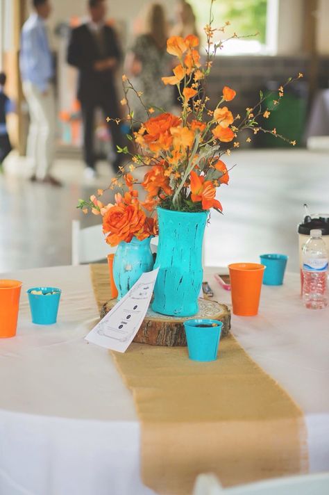 Rustic barn wedding. Teal and orange. Orange And Teal Birthday Party, Burnt Orange And Teal Wedding Centerpieces, Teal Orange And Yellow Wedding, Teal And Orange Centerpieces, Burnt Orange And Turquoise Wedding, Orange And Teal Wedding, Teal And Burnt Orange Wedding, Peach Wedding Centerpieces, Teal Centerpieces