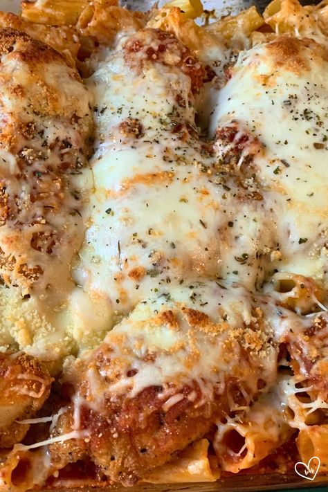 Enjoy all the flavors of chicken parmesan with less work with this shortcut chicken parmesan bake. Made with frozen breaded chicken tenders, this dish is quick, easy and perfect for busy weeknights. A comforting and delicious meal that the whole family will love. Chicken Parmesan Casserole With Frozen Chicken, Chicken Parmesan Freezer Meal, Chicken Parm Healthy Baked, Easy Chicken Parmesan With Frozen Chicken Patties, Baked Chicken Parmesan Recipe No Breading, Chicken Parmesan Bake, Breaded Chicken Parmesan, Easy Weeknight Casseroles, Quick Meals For Kids