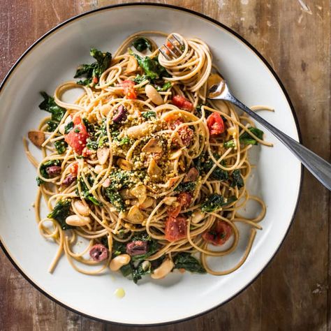 Vegan Whole-Wheat Spaghetti with Greens, Beans, and Tomatoes | America's Test Kitchen  white miso and cheesy-tasting nutritional yeast Pasta With Kidney Beans, Health Meal Plan, Beans And Tomatoes, Spagetti Recipe, Canning Crushed Tomatoes, Whole Wheat Spaghetti, America's Test Kitchen Recipes, Green Beans And Tomatoes, White Miso