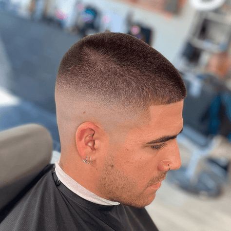 Side profile of a man with a number 3 buzz cut fade, showcasing the clean, uniform length on top transitioning into a smooth fade on the sides and back. The hairstyle highlights his facial features, earrings, and well-groomed appearance, perfect for a modern, stylish look Number 3 Haircut, Modern Man Style, Haircut Length, Buzz Cut Fade, Crop Haircut, Moustache Wax, Modern Mens Fashion, Beard Wash, Number Three