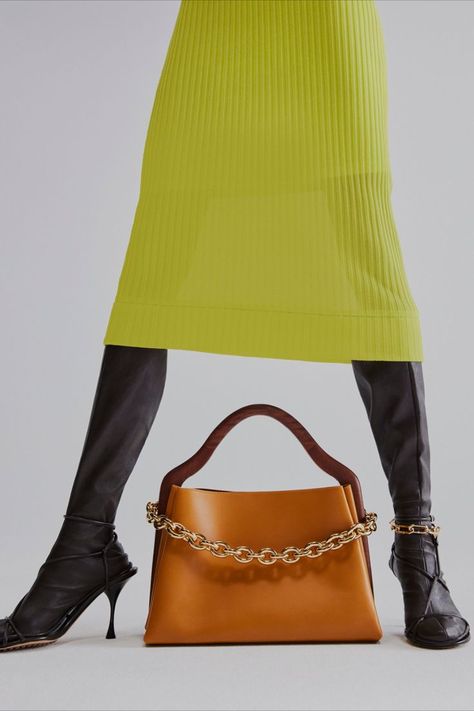 Bottega Veneta Mount bag yellow Ribbed-knit silk midi dress black Dot leather boots Wardrobe 02 collection Mytheresa Editorial Bag Shoot, Bag Editorial Photography, Bag Editorial, Product Editorial, Bag Shoot, 70s Fashion Disco, Bag Photography, Fashion Still Life, Photography Bags