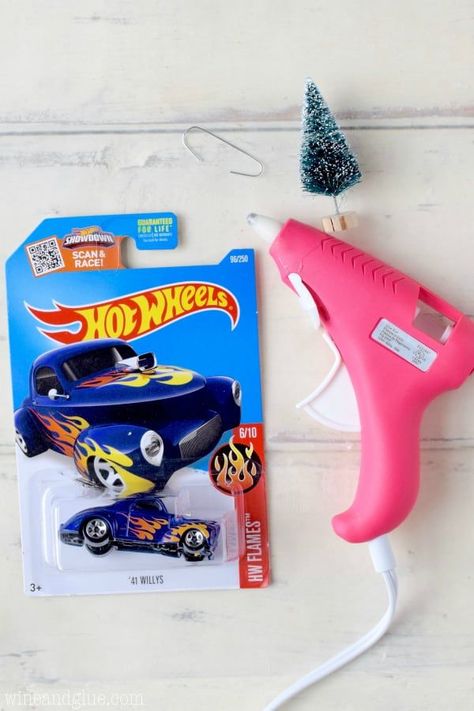 These Matchbox Car Ornaments are crazy simple to make and so cute! Perfect for gifting or keeping! Car Ornaments Diy, Target Dollar Spot, Matchbox Cars, Valentine Photography, Ornament Hooks, Toy Brand, Car Ornaments, Hot Wheels Cars, Car Gifts