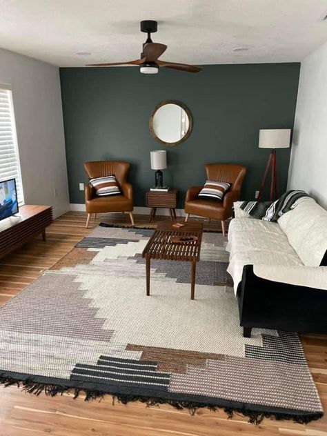 One Wall Accent Color Living Room, Dark Green Accent Wall Living Room Tv, Industrial Accent Wall Living Room, Small Living Room With Accent Wall, Living Room Accent Wall Green, Subtle Accent Wall Living Room, Accent Wall Sitting Room, Painted Accent Wall Behind Tv, Dark Green Living Room Accent Wall