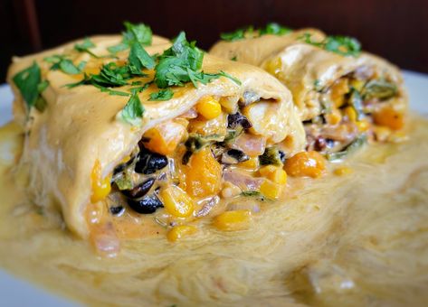 QUESO SMOTHERED WET BURRITOS Queso Sauce, Vegan Weeknight Meals, Cashew Queso, Sauteed Peppers And Onions, Sauteed Peppers, Poblano Peppers, Vegan Cheddar, Green Enchilada Sauce, Vegan Cream