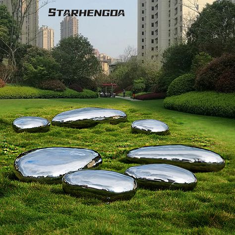 Metal stainless steel pebble decoration | Lawn Villa garden square outdoor viewing pool Cobblestone Garden, Mirror Sculpture, Villa Garden, Stainless Steel Mirror, Rock Sculpture, Steel Mirror, Garden Sculptures, Park Landscape, Garden Villa