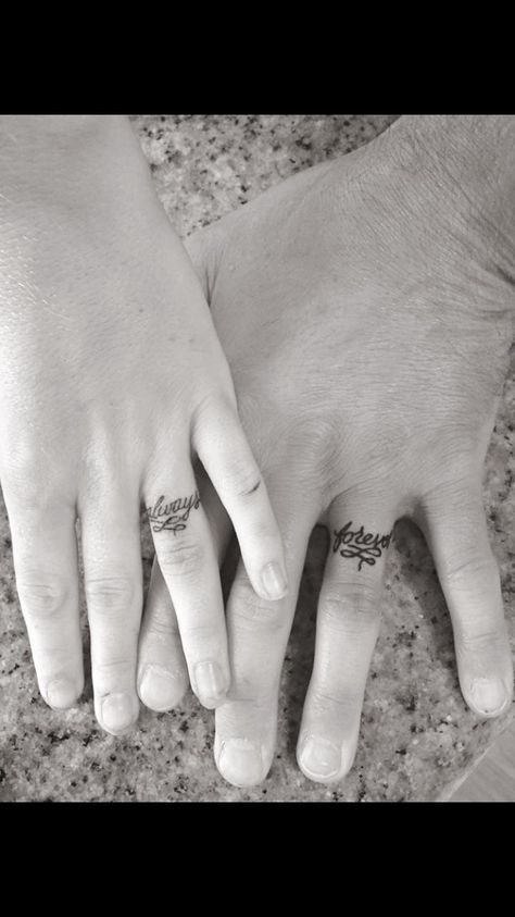 Couple Ring Finger Tattoos, Wedding Ring Finger Tattoos, Wedding Ring Tattoos, Married Couple Tattoos, Heart With Infinity Tattoo, Marriage Tattoos, Finger Tattoos For Couples, Ring Tattoo Designs, Wedding Band Tattoo