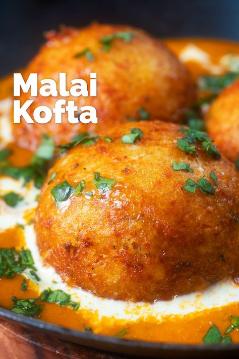 Malai kofta is a glorious vegetarian dish from the north of India featuring fried balls of potato and paneer in a spicy tomato based gravy. This dish has a long old list of ingredients and may seem quite complex, but it is a series of very simple tasks and it cooks in a shade under 1 hour! Paneer Kofta, Fried Balls, Kofta Recipe, Paneer Dishes, Malai Kofta, Vegetarian Dish, Veg Dishes, Indian Cooking Recipes, Tasty Recipes Videos