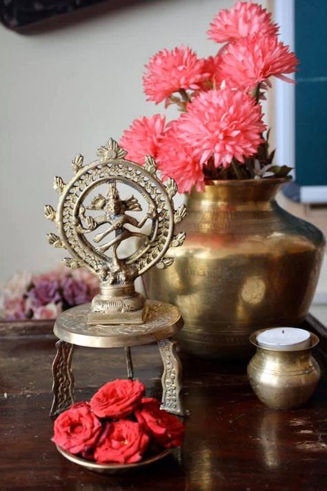 table set up with brass vessels, pooja stand, statue and flowers, a vintage decor arrangement Pooja Stand, Designer Fans, Home Decor India, Statue Decor, Wooden Street, Quirky Home Decor, Indian Homes, Brass Statues, Table Set Up