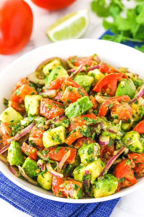 With fresh ingredients and a few seasonings, this Tomato Avocado Salad is an addictive side dish that comes together in minutes. Serve as a side to grilled chicken or steak, or add on top of a salmon fillet. You can even add it to tacos! Tomato Avocado Salad Recipes, Tomato Avocado Salad, Guacamole Salad, Avocado Recipes Easy, Eating Bird Food, Healthy Mexican Recipes, Tomato Avocado, Avocado Tomato Salad, Salmon Fillet