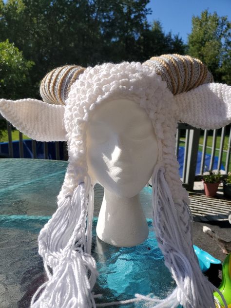 Crocheted ram hat. Available at @MarysLittleLambCrochet on Facebook Sheep Hat, Crochet Goat Ears, Crochet Ram Horns Free Pattern, Horns Crochet Pattern, Crochet Sheep Hat, Crochet Horn Hat, Krampus Hat Crochet, Crochet Baphomet Hat, Crochet Cowboy Hats