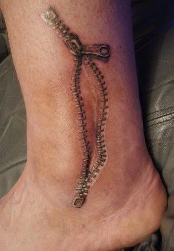 Scar tattoo Zipper Tattoo, Corset Tattoo, Tato 3d, Tattoo Over Scar, Tattoos Pinterest, Tattoos To Cover Scars, Ankle Tattoo Designs, Ankle Tattoos, Scar Tattoo