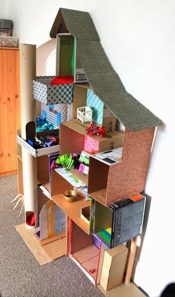 Construct a doll's house out of recycled cardboard against the wall.  Endless fun!! Cardboard Dollhouse, Dollhouse Projects, Moving Boxes, Barbie House, Diy Cardboard, Decorative Paper, Childrens Crafts, Cardboard Crafts, Diy Dollhouse