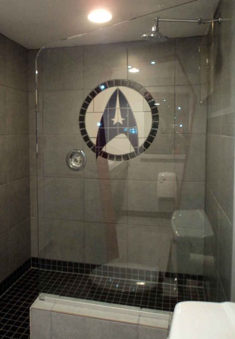 Starfleet mosaic tiling, inspired! | A Star Trek Fan Spent $30,000 Turning Her Basement Into The Starship Enterprise Shower Redo, Star Trek Decor, Lego Bathroom, Star Trek Theme, Basement Flat, Starfleet Academy, Uss Enterprise Star Trek, Star Trek Art, Star Trek Original