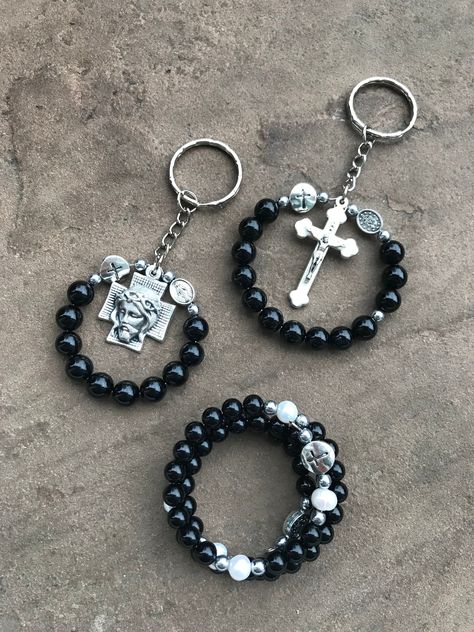 This rosary bracelet and key ring set was designed by Carole as a custom order, but is available for anyone. If you only want part of the set please message me on Etsy. The gemstone beads are black agate and the bracelet includes fresh water pearls. This bracelet is for a very small wrist however it can be made for other sizes. The set comes in organza gift bags and instructions and suggestions for prayer are included. Join the Perles of Wisdom online community by copying this link into your bro White Rosary, Custom Rosary, Rosary Jewelry, Christian Bracelets, Bead Crochet Patterns, Bracelet Craft Diy, Catholic Jewelry, Rosary Bracelet, Bracelet Diy