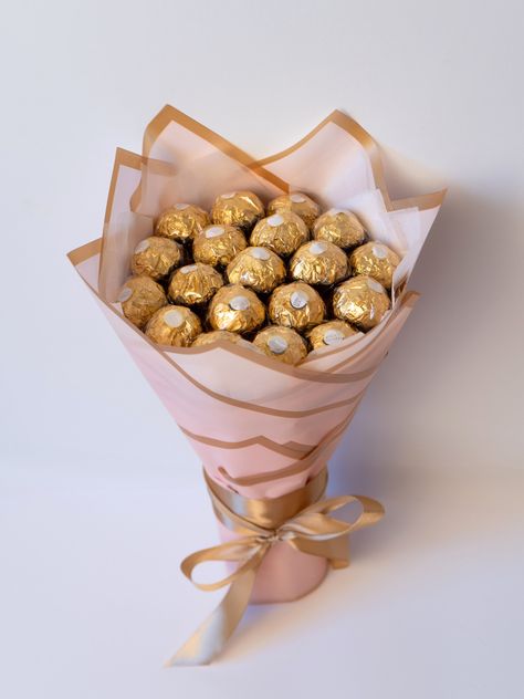 Delicate sweet bouquet with delicious chocolates Ferrero Rocher.  Delicate cream rose sweet bouquet Delicate deep rose sweet bouquet Delicate white sweet bouquet Delicate purple sweet bouquet Lights for a bouquet as a gift. Bouquet With Chocolates, Chocolates Ferrero, Ferrero Rocher Bouquet, Birthday Candy Bouquet, Chocolate Flowers Bouquet, Luxury Bouquet, Diy Graduation Gifts, Edible Bouquets, Mother's Day Gift Card