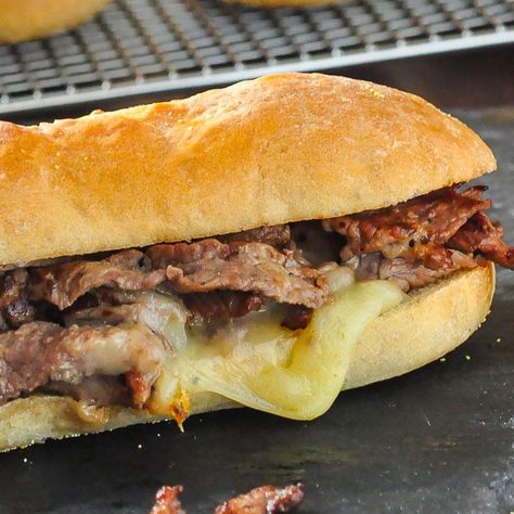 Homemade Philly Cheesesteak, a near perfect version of this famous sandwich that you can make at home, on the closest thing to an authentic cheesesteak roll I've ever tried.#sandwiches #superboel #gamedayfood #tailgating Homemade Philly Cheesesteak, Best Rolls, Philadelphia Cheesesteak, Philly Cheese Steak Recipe, Cheese Whiz, Kaiser Rolls, Cheese Steak Sandwich, Rock Recipes, Beef Strips