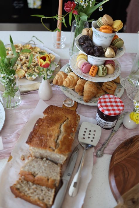 This garden tea party themes bridal shower was made complete with these tea cup tiers and all of the delicious tea party treats. Featured here we have banana bread, macarons, croissanta, jam, and chocolates. Book Club Tea Party, Shower Food Display, Bridal Shower Food Display, Tea Party Themes, Tea Party Treats, Party Food Table Ideas, Bridal Shower Tea Party Theme, Yea Party, 30th Bday Party