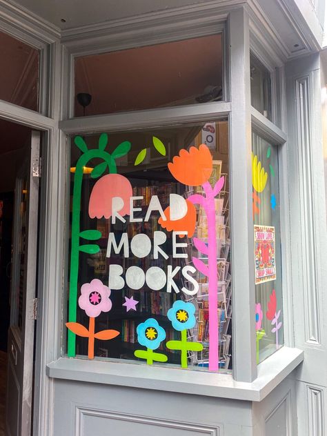 Class Window Display, Unique Book Display, Freestanding Retail Display, Christian Book Store Ideas, Art Studio Window Display, Library Window Art, Bookstore Mural, Bookstore Window Displays, Colorful Bookstore