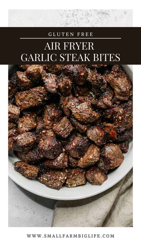 This easy recipe for air fryer garlic steak bites is perfect for quick weeknight meals. These juicy cuts of steak are keto friendly. The steak comes out tender on the inside and perfectly broiled on the outside using the air fryer. #glutenfree #recipe Top Sirloin Steak Bites Air Fryer, Beef Eye Of Round Steak Recipes Air Fryer, London Broil Steak Bites, Eye Of Round Steak Recipes Air Fryer, Air Fryer London Broil Recipes, Air Fryer Garlic Steak Bites, Garlic Butter Steak Bites Air Fryer, Garlic Steak Bites Air Fryer, Inside Round Steak Recipes