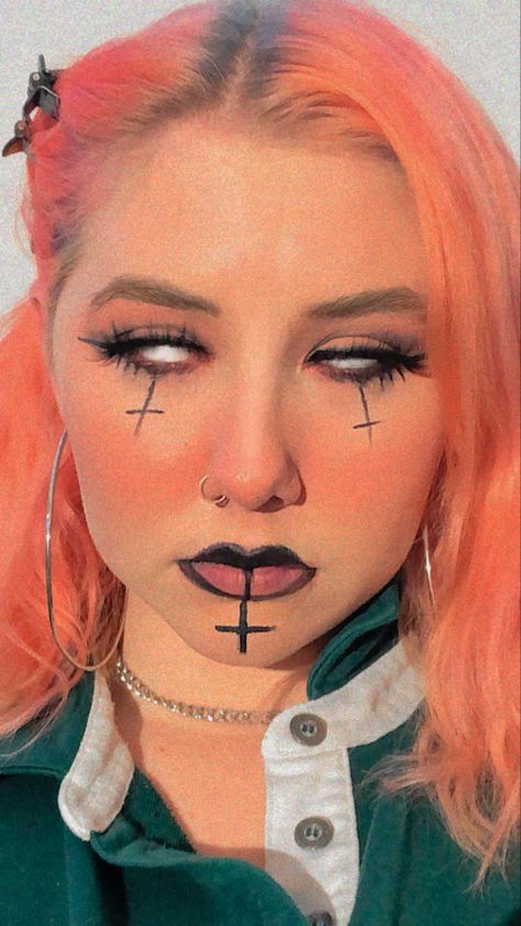 Person with pink hair and alternative makeup with pink blush, eyeshadow, eyeliner, upside down crosses. Cross Makeup Look, Cross Eyeliner, Satanic Makeup, Cross Makeup, Upside Down Cross, Fair Outfit, Fair Outfits, Alt Makeup, Ren Fair