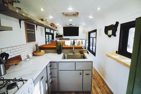 Perfect kitchen! I can't believe this family build out a bus that fits 5 people! So much cool modern storage and organization in the white interior! Converted Bus For Sale, Bus Remodel, Vanlife Travel, School Bus Tiny House, School Bus Camper, School Bus House, Wohne Im Tiny House, Converted School Bus, Converted Bus