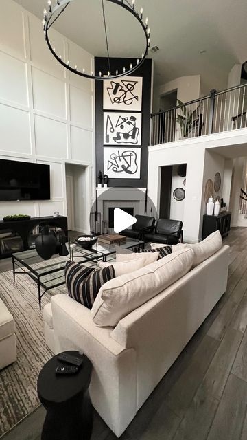 Kimberly  Cherie Moore on Instagram: "Dealing with high ceilings can sometimes be overwhelming as you figure out what to add to the space. However, incorporating millwork can be a great way to address this. Also, when thinking about purchasing art for your walls, it’s important to choose pieces that fit the scale of your space for a cohesive look." Tv On Wall With High Ceiling, High Ceiling Tv Wall Ideas, Living Room With High Ceilings, Round House Plans, Ohio House, Ceiling Tv, High Ceiling Living Room, Angled Ceilings, Living Room Corner