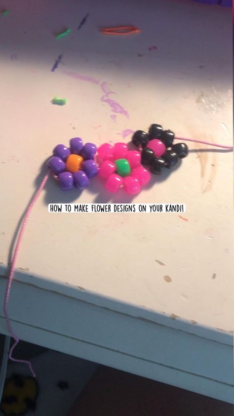 How to make flower designs on your kandi! | Pinterest Kandi Flower, Flower Kandi, Emo Diy, Kandi Diy, Silly Crafts, Hannah Ideas, Diy Kandi Bracelets, Kandi Perler, Diy Kandi