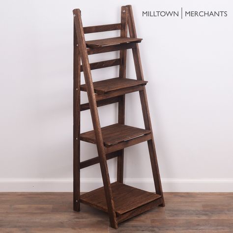 "MILLTOWN MERCHANTS LADDER BOOKSHELF - The Milltown Merchants dark brown bookshelf comes with a unique rustic finish paired with a clean, modern silhouette. The carefully curated display is great for showcasing photo frames, succulents, art, small house plants, wicker baskets, and books. Create an eye catching display to compliment your unique space with the Milltown Merchants wooden bookshelf! FUNCTIONAL DESIGN - Traditional bookcases can look uninteresting and dry, the Milltown Merchants leani Sauder Bookcase, Succulents Art, Brown Bookshelves, Leaning Bookshelf, Farmhouse Bookshelf, Traditional Bookcases, Wooden Ladder Shelf, Leaning Bookcase, Rustic Bookshelf