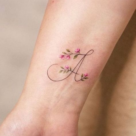 19 Creative Letter A Tattoo Designs 2024: From Minimalist to Monograms - Find Your Style Hand Tattoo Images, Butterfly Tattoos Images, Monogram Tattoo, Delicate Tattoos For Women, Carnation Tattoo, M Tattoos, Writing Tattoos, Парные Тату, Initial Tattoo