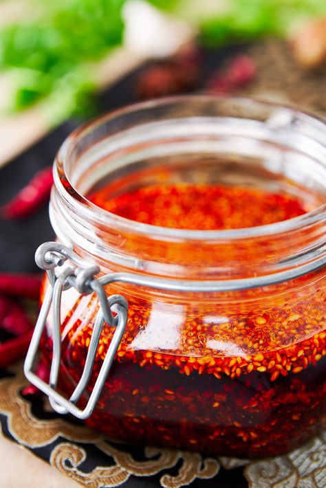 This easy Sichuan-style crispy garlic chili oil comes together in just minutes and makes for a delicious spicy condiment that you'll want to put on everything.  #chinesefoodrecipes #chinesefood #hotsauce #spicy #condiments Garlic Oil Recipe, Chinese Fondue, Chinese Chili Oil, Chinese Chili, Hot Chili Oil, Chili Oil Recipe, How To Make Chili, Dried Scallops, Crispy Garlic