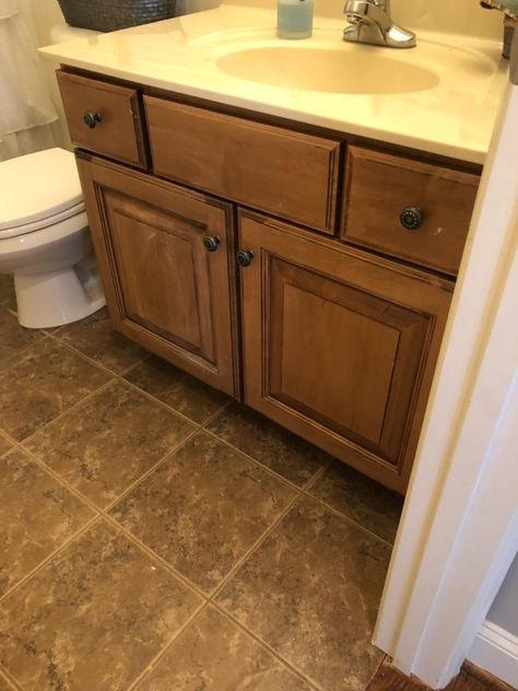 bathroom cabinets before paint Dark Wood Vanity Bathroom, Small Dark Bathroom, Brown Tile Bathroom, Painting Cabinets Diy, Oak Bathroom Cabinets, Bathroom Cabinet Colors, Bathroom Cabinet Makeover, Small Bathroom Paint, Painted Vanity Bathroom