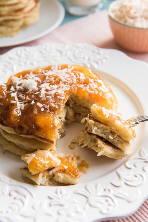 Toasted Coconut Pancakes are light, fluffy, and so easy to make that you don't need to save them just for weekends! Change up your breakfast routine with these yummy and unique pancakes. Made with coconut milk instead of buttermilk, with lots of toasted, sweetened coconut, your family is sure to love these delicious toasted coconut pancakes! French Fruit Tart Recipe, Easy Fruit Tart, Showstopper Dessert, Jar Desserts, Mason Jar Desserts, Fruit Tart Recipe, Coconut Pancakes, Jar Food, Dessert In A Jar