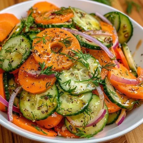 🥒🥕 Refresh your palate with this light, crunchy cucumber and carrot salad! #CucumberCarrotSalad #HealthyEats 🍽️ Cucumber and Carrot Salad 🛒 Ingredients: 200 grams cucumbers, thinly sliced 200 grams carrots, julienned 50 grams red onions, thinly sliced 15 grams fresh dill, chopped Dressing: 30 ml olive oil 15 ml white vinegar 10 ml honey Salt and pepper to taste 👩‍🍳 Instructions: Prepare Dressing: Whisk together olive oil, vinegar, honey, salt, and pepper. Combine Salad: In a large bowl, m... Benefits Of Cucumber, Salad With Dill, Fresh Vegetable Recipes, Healthy Food Habits, Instagram Recipes, Fresh Salad Recipes, Meat Free Recipes, Carrot Salad, Healthy Food Motivation