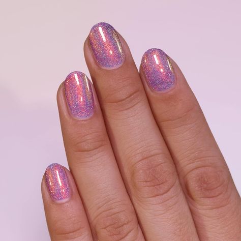 MAGICAL VIOLET HOLOGRAPHIC JELLY - Step into a world of enchantment with Fairy Dust. Infused with a generous dusting of intense orange sparkle that shimmers and shifts like magic, Fairy Dust dazzles with every movement of your hands. Full of charm, Fairy Dust’s holographic sparkle creates a finishing touch to this mesmerizing beauty. 
#AD Slay Nails, Fairy Nails, Jelly Nail Polish, Orange Sparkle, Jelly Nail, Magic Fairy, Mesmerizing Beauty, Beauty Ad, Jelly Nails