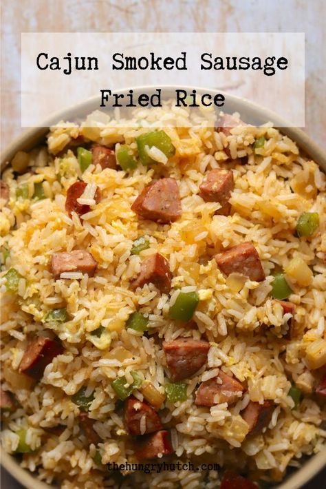 I like to think of fried rice as a method to serve up any type of flavors. Here, I incorporate Cajun smoked sausage and Creole seasoning for a New Orleans-inspired twist. Cajun Fried Rice Recipe, Different Types Of Rice Recipes, Cajun Fried Rice, Cajun Meals, Cajun Rice Recipe, Sausage Fried Rice, Cajun Party, Nola Food, Cajun Rice